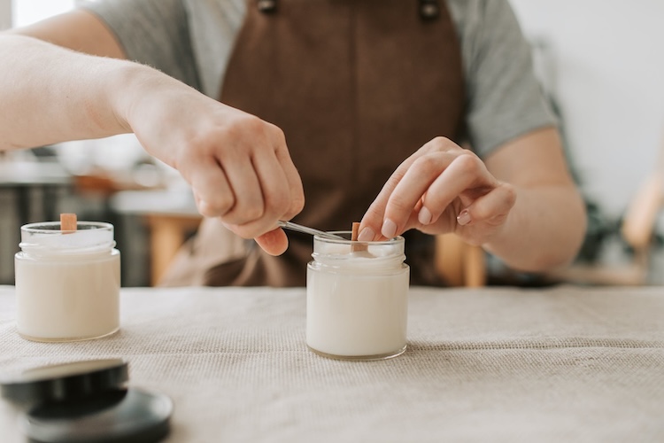 person making a candle