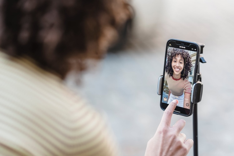 woman vlogging outside