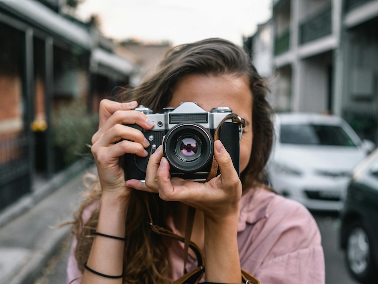 woman using camera