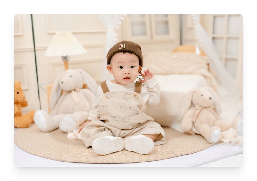 baby sitting with toys