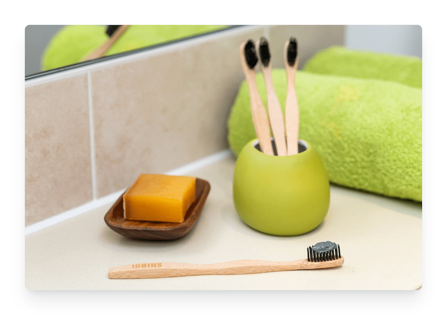 bamboo toothbrushes on bathroom counter